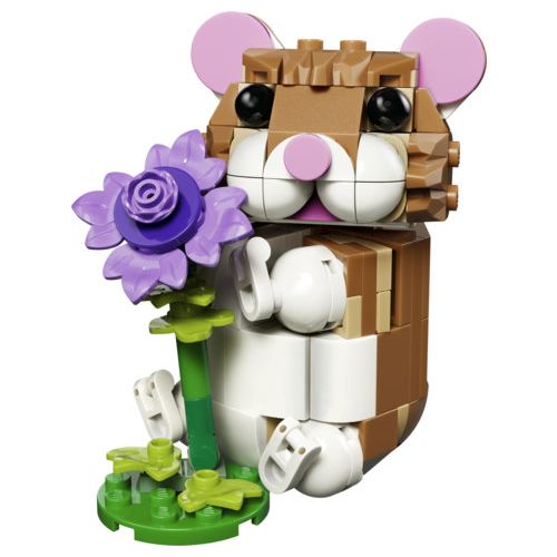 Le hamster mignon avec une fleur