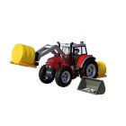 Grand tracteur avec botte de foin
